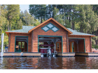 Custom floating boathouse foundation for fluctuating water levels