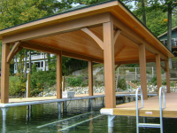 Hip style open boathouse installed on our permanent pile dock